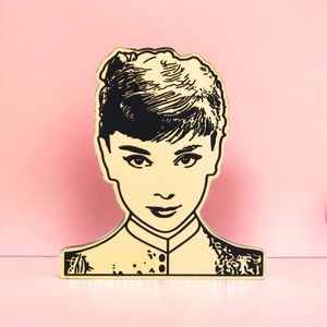Audrey Hepburn Breakfast at Tiffany’s shiny gold tone metal etched brooch